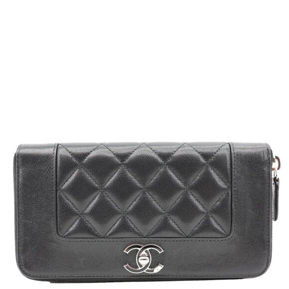 CHANEL Handbags - Chanel  Mademoiselle Vintage Quilted Leather Zip Around Wallet Black